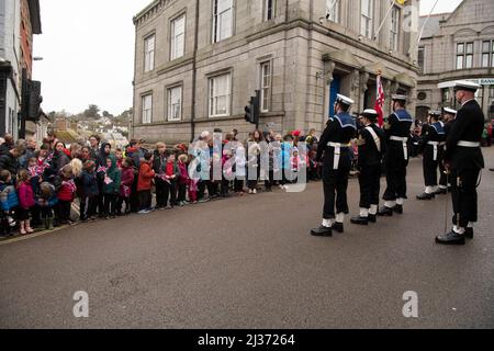 Freedom Parade in Helston Cornwall,RNAS Culdrose Navy personnel form up at approx 10am and march down Meneage Street to the Guildhall, where the Mayor and Captain of Culdrose inspect the guard. The Mayor's Chaplain leads prayers, the Mayor addresses the Parade and then the Captain of RNAS Culdrose responds. The Parade is an important day in the civic calendar, as well as for the people of the town, many of whom have links with the air base. All are welcome to watch this unique and impressive spectacle, Credit: kathleen white/Alamy Live News Stock Photo