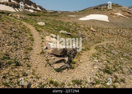 Trail Bends Around Rock pile In Grand Teton National Park Stock Photo