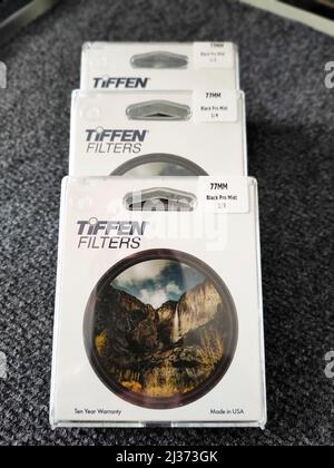 04.10.2021 Warsaw, Poland. Three Tiffen Promist filters in their packaging. High quality photo Stock Photo