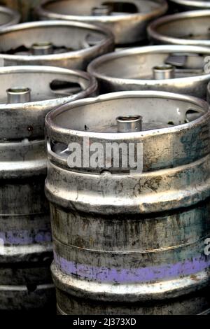 Large group of steel metal beer, lager or ale barrels, casks or vats. Stock Photo