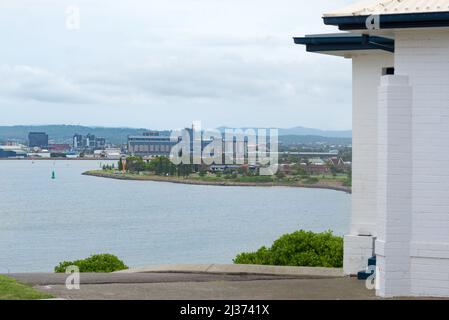 Looking from Nobbys Head Lighthouse across Newcastle Harbour, over the point at Stockton to the Graincorp Terminal at Carrington, Newcastle, Australia Stock Photo