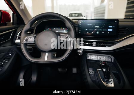 Interior view of car, luxury car steering wheel and dashboard Stock Photo