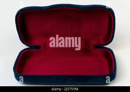 Blue red glasses jewelry velvet box isolated on white background, consept red case, glasses sunglasses bag front view Stock Photo