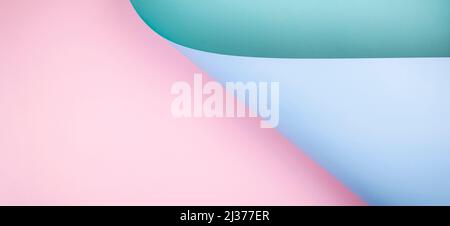 Abstract geometry composition background in pastel blue, pink, green colors with geometric shapes and curved wave lines. Top view, copy space Stock Photo