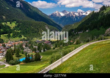 Bergun village and the alps mountains. The glacier express train from Zermatt to St.Moritz, panoramic train that crosses Alps through the Unesco World Stock Photo