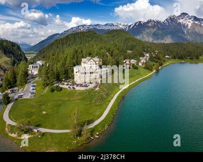 Aerial views of Waldhaus Am See hotel and the mountain lake of St. Moritz in the summer time, Sankt Moritz, Engadin, Grisons, Switzerland.