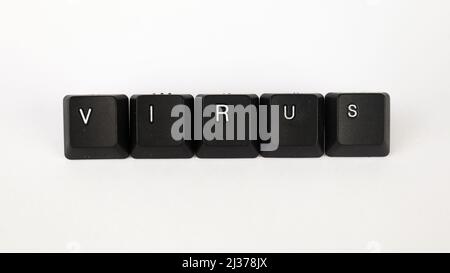 Virus text created with keyboard keys isolated on white background, white virus on black keyboard, top view Stock Photo