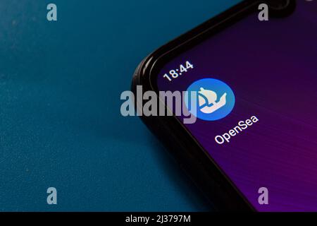 OpenSea mobile application icon on smartphone screen. Afyonkarahisar, Turkey - April 5, 2022. Stock Photo