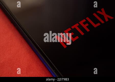 Netflix logo on smartphone screen. Popular broadcasting service Netflix. Afyonkarahisar, Turkey - April 4, 2022. Stock Photo