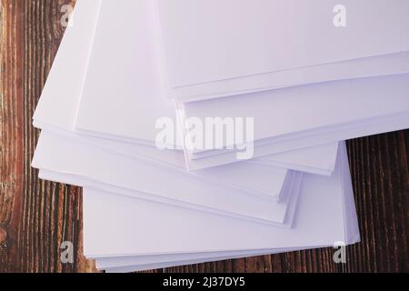 close up of stack of empty paper on table  Stock Photo
