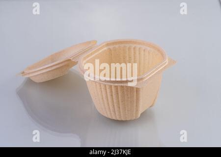 Cartoon brown boxes & plates for food & Salad with different sizes Stock Photo