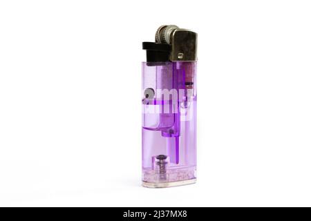 Purple colored plastic lighter on an isolated white background. Stock Photo