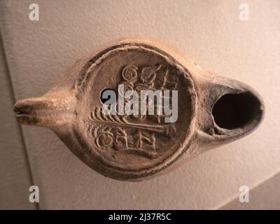 old roman terracotta lucern lamp detail Stock Photo