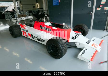 Warren Briggs 1980, Red and White McLaren M29, formerly driven by John Watson, in the International Pits, at the 2021 Silverstone Classic Stock Photo