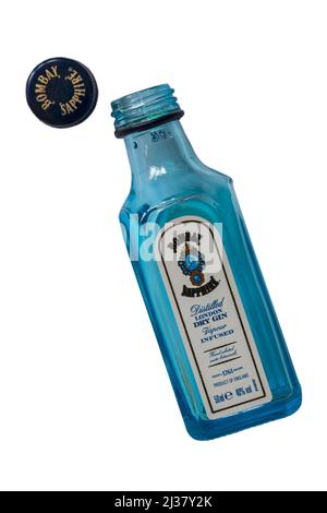 empty miniature bottle of Bombay Sapphire Gin Distilled London Dry Gin with top cap removed isolated on white background Stock Photo