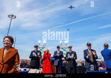 Wilmington, United States of America. 02 April, 2022. U.S President Joe Biden and First Lady Jill Biden, center, applaud during the commissioning commemoration ceremony for the Virginia-class attack submarine USS Delaware, April 2, 2022 in Wilmington, Delaware.  Credit: Adam Schultz/White House Photo/Alamy Live News Stock Photo