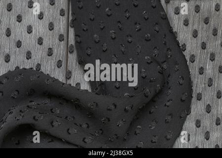 A soft black fabric background. Graphic resources Stock Photo
