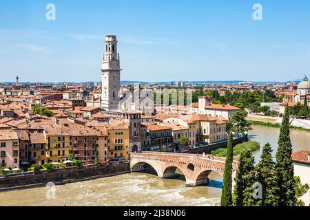 Verona, Italy - August 5, 2009: panorama of Verona with view of the old dome and the roman bridge, spanning river Etsch Stock Photo