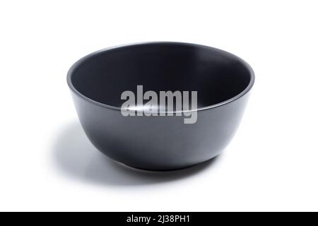 Black clay bowl isolated on white background Stock Photo