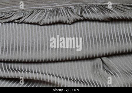 A soft olive green fabric background. Graphic resources Stock Photo