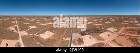 Loco Hills, New Mexico - A panorama showing oil wells that cover the landscape in the Permian Basin. The Permian Basin is a major oil and gas producin Stock Photo