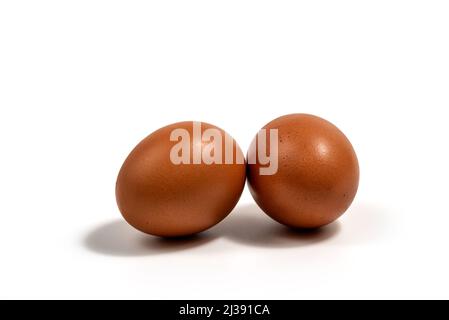 Two eggs isolated on white background with clipping paths for graphic design. The food is obtained from chicken that is high in protein and suitable f Stock Photo