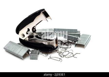 Anti-stapler with clerical staples on a white background. Stationery. stapler Stock Photo