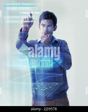 Photo manipulated shot of a young man using a theoretical digital interface..All screen content is designed by us and not copyrighted by others, and Stock Photo
