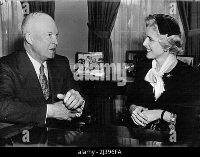 President Eisenhower And Mrs. Clare Boothe Luce -- Photographed at the White House, President Dwight Eisenhower discussed at length the changes of government in Italy and the Trieste problem with America's Ambassador to Rome, Mrs. Clare Boothe Luce. America's ambassador to Rome, Mrs. Clare Booth Luce, confers with President Eisenhower just before her departure to Italy. She also had last-minute talks with Vidor. February 15, 1954. (Photo by Camera Press). Stock Photo