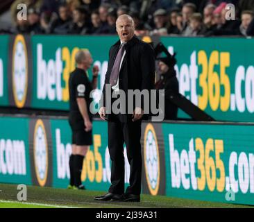 Burnley, England, 6th April 2022.   Sean Dyche manager of Burnley reacts as referee Michael Dean checks the VAR screen during the Premier League match at Turf Moor, Burnley. Picture credit should read: Andrew Yates / Sportimage Stock Photo