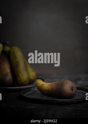 Abate Fetel an European Pear on table. Stock Photo