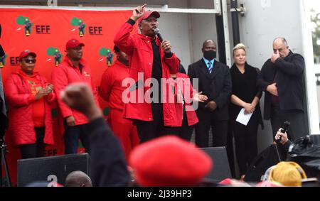 Stellenbosch, South Africa. 6th Apr, 2022. Julius Malema (C), leader of South African party Economic Freedom Fighters (EFF), addresses party members during a march in Stellenbosch, outside Cape Town, South Africa, on April 6, 2022. South Africa's third largest political party, Economic Freedom Fighters (EFF), on Wednesday marched to the office of Johann Rupert and asked him, the country's richest person, to release his lands to black people. Credit: Xabiso Mkhabela/Xinhua/Alamy Live News Stock Photo