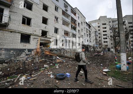 A view of a damaged residential area in the city of Borodianka, northwest of the Ukrainian capital Kyiv. After invading Ukraine on February 24th, Russian troops took up positions on the outskirts of the Ukrainian capital Kyiv. Facing fierce resistance, and after taking heavy losses, Russian forces have since withdrawn from a number of villages they occupied including Bucha, Borodianka, in Bucha district. Burnt out Russian tanks and armored vehicles and civilian bodies strewn along streets and roads are testimony to ferocity of the battles in these areas. Stock Photo