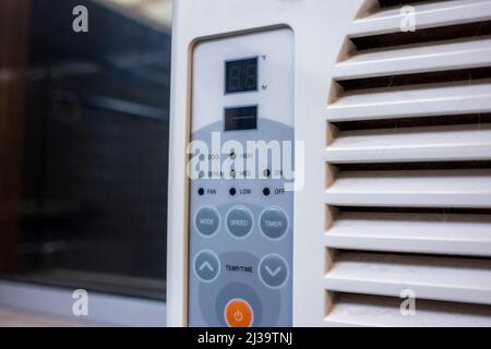 Selective, macro focus on a control panel on an air conditioning unit Stock Photo