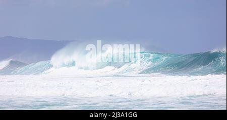 Giant waves crashing at Banzai Pipeline Stock Photo