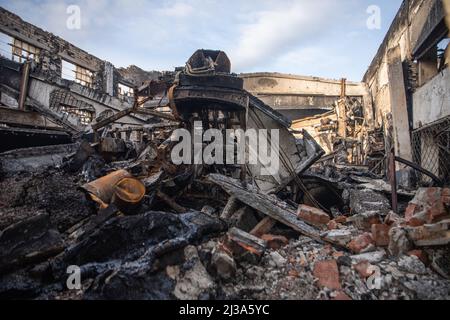 Bucha, Ukraine. 06th Apr, 2022. View of a destroyed factory in Bucha, a town near Kyiv that was recently liberated from Russian forces. Russia invaded Ukraine on 24 February 2022, triggering the largest military attack in Europe since World War II. Credit: SOPA Images Limited/Alamy Live News Stock Photo