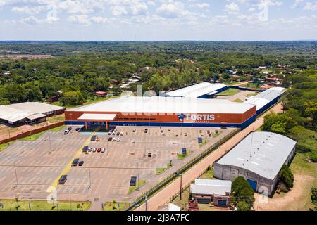 Coronel Oviedo, Paraguay - February 01, 2022: Aerial view of the newly opened Fortis market in Coronel Oviedo where Paraguayans can shop for cheap. Stock Photo