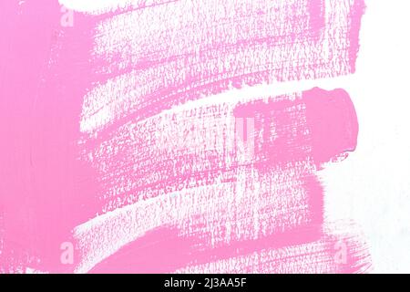 Pink pattern of color paint brush on the white wall for design in your work concept. Stock Photo