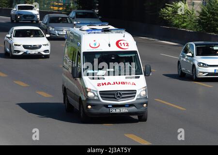 ISTANBUL, TURKEY - MARCH 27, 2022:  Turkish ambulance vehicle on the city road. Emergency help. Ambulance service 112. Stock Photo
