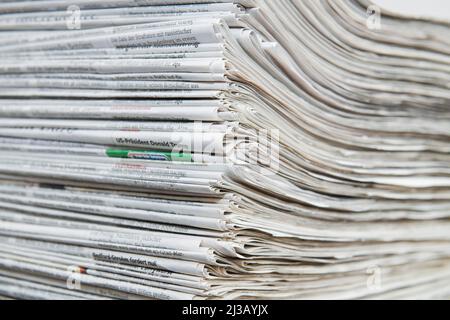 Stack of newspapers Stock Photo
