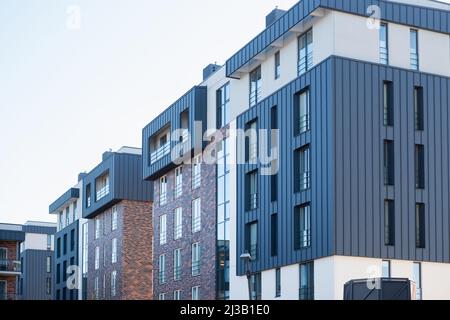 Modern residential apartment building. Real estate development. New building complex in Europe. Stock Photo