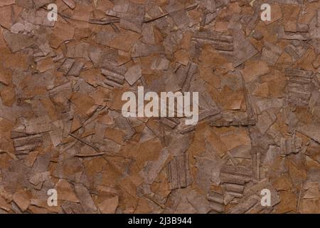 Rough old textured craft cardboard horizontal background handmade from torn pieces for design Stock Photo