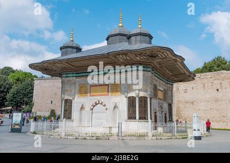ISTANBUL, TURKEY - JULY 22, 2021:  Fountain of Ahmed III. The fountain was built in 1728. Standing between Hagia Sophia and Topkapi Palace entrance, I Stock Photo