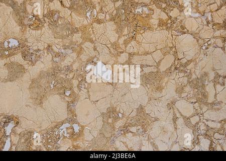 Peeling veined brown stone wall. Natural weathered pattern. Abstract background Stock Photo