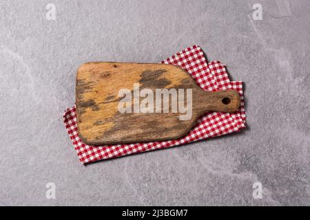 Cutting board on gray background Stock Photo
