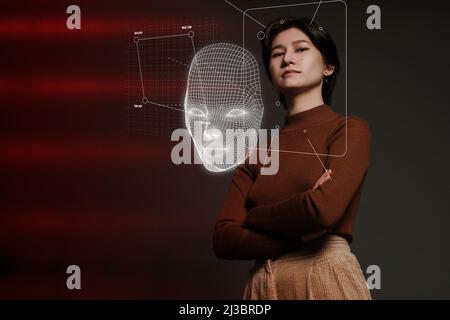 3D face mapping of young woman Stock Photo