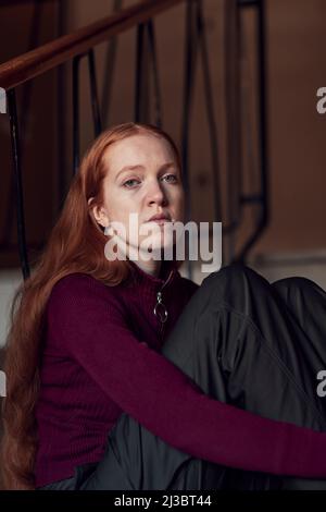 Portrait of young redhead woman Stock Photo