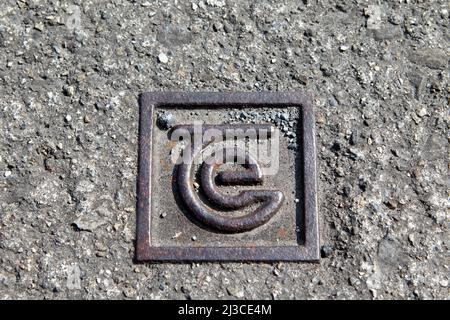 telecom eireann logo on underground telephony cable access point castlebar county mayo republic of ireland Stock Photo