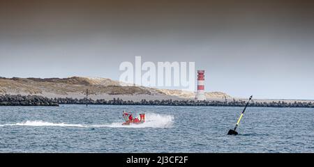 Helgoland, Germany. 26th Mar, 2022. View of the Helgoland dune with the lighthouse on the south beach. Credit: Markus Scholz/dpa/Alamy Live News Stock Photo