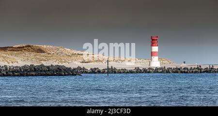 Helgoland, Germany. 26th Mar, 2022. View of the Helgoland dune with the lighthouse on the south beach. Credit: Markus Scholz/dpa/Alamy Live News Stock Photo